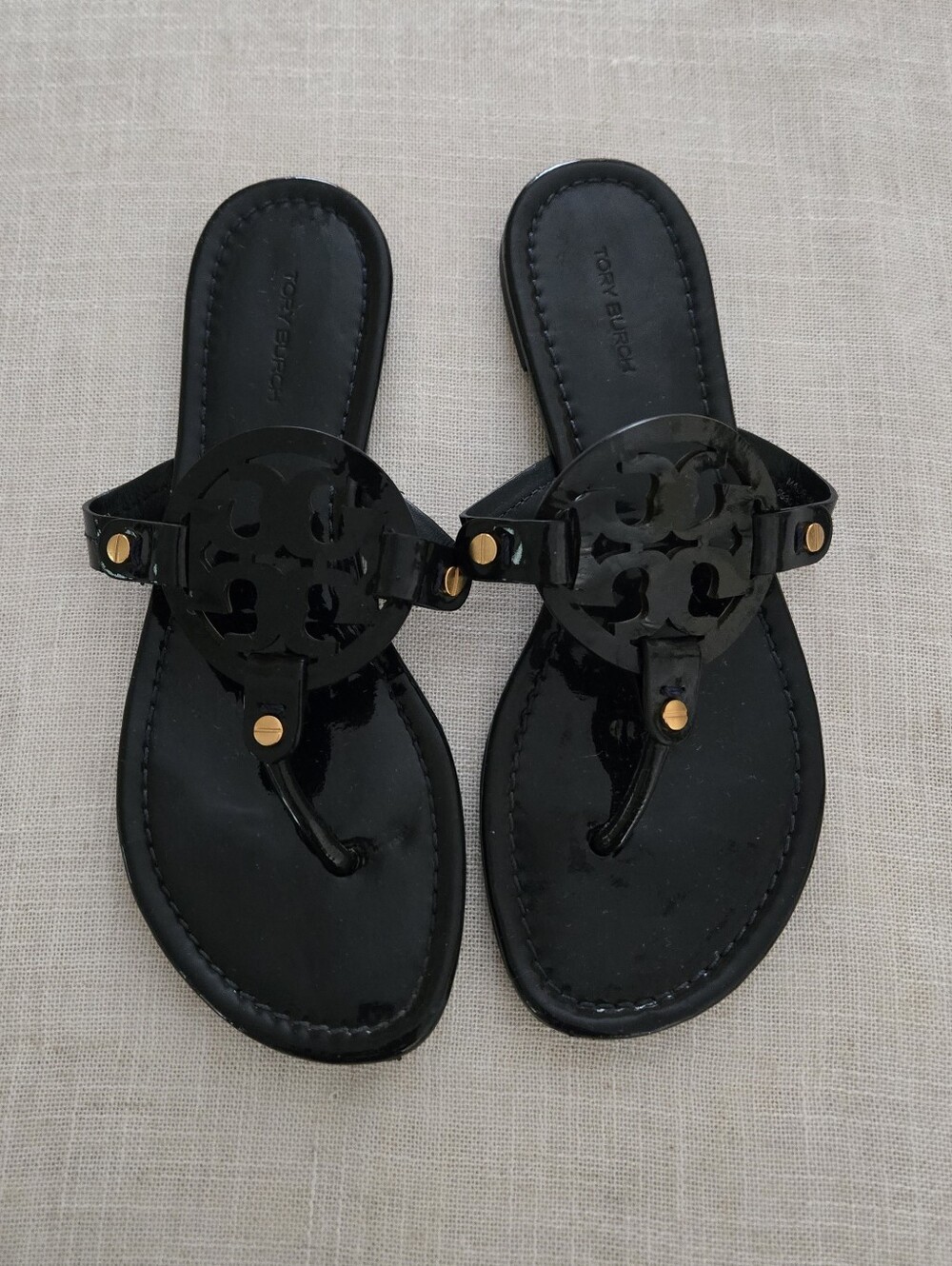 Tory Burch Navy Patent Logo Thong Sandals with Gold Accents
